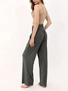 Удобные и стильные женские однотонные широкие брюки с карманами на высокой талии и свободной посадкой - идеально подходят для занятий йогой